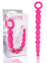 Two hands holding BOLAS LUXE SILICONE BEADS, showcasing the luxurious and high-quality design for enhanced pleasure and satisfaction